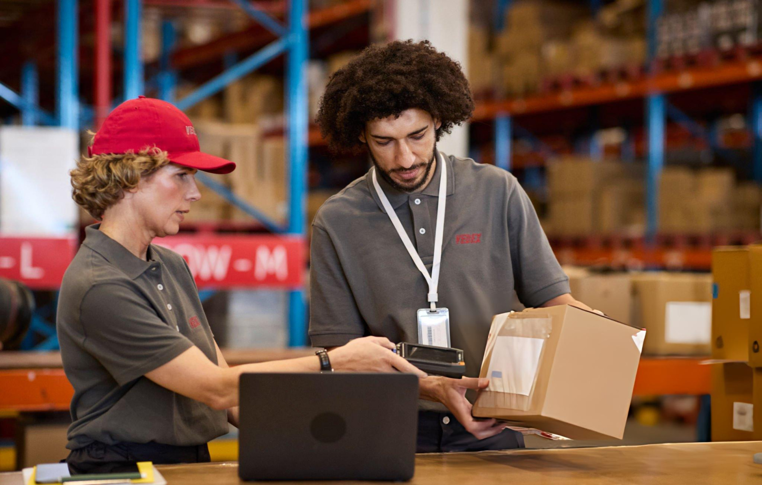UNN Movers coordinator and warehouse crew checking an interstate consignment at the Parramatta hub